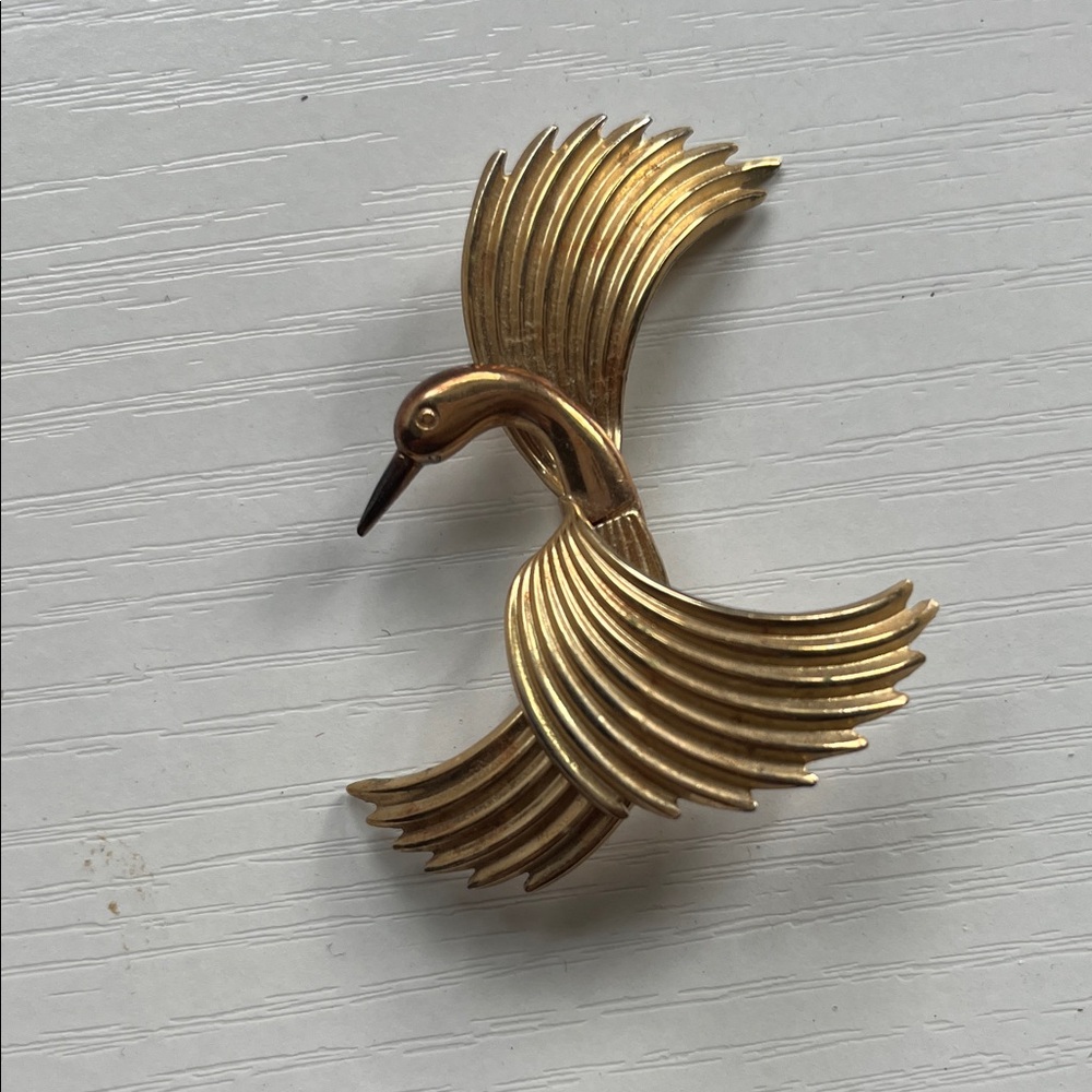 Elegant Gold Bird Brooch